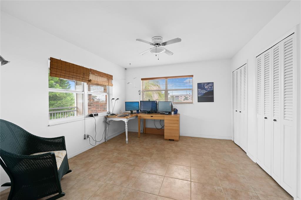 2501 South Ocean Boulevard, Unit 301 Boca Raton, FL 33432 - Photo 13 of 32 a living room with furniture and a window