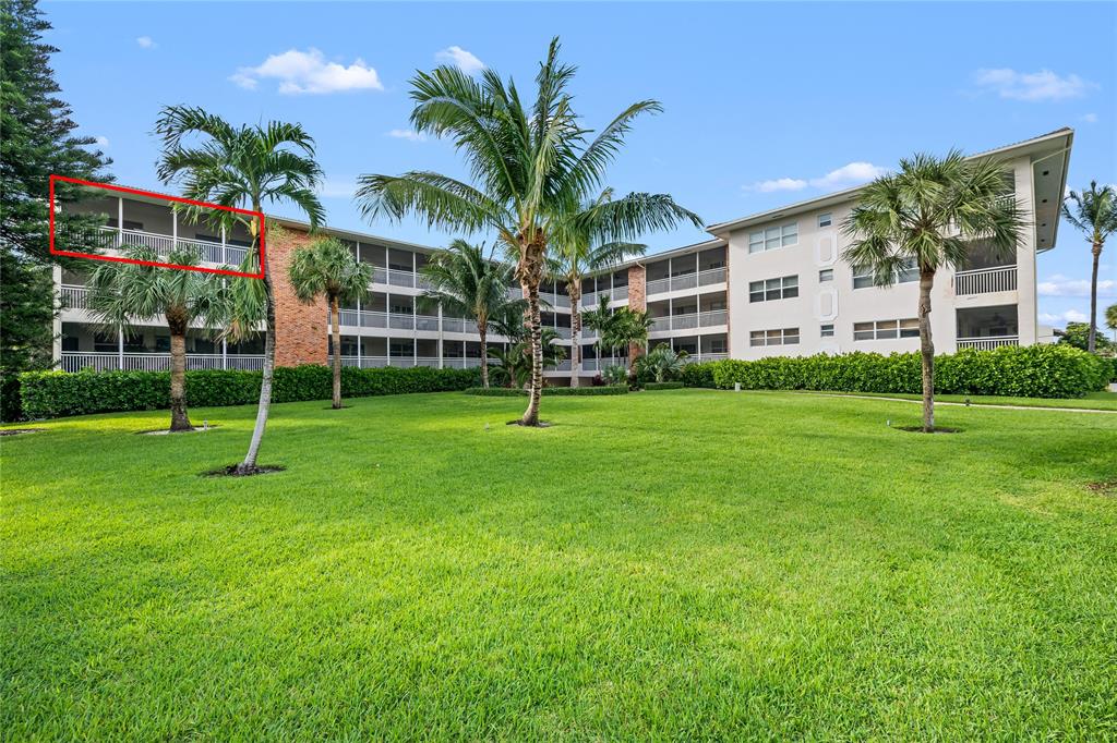 2501 South Ocean Boulevard, Unit 301 Boca Raton, FL 33432 - Photo 31 of 32 a front view of house with yard and green space