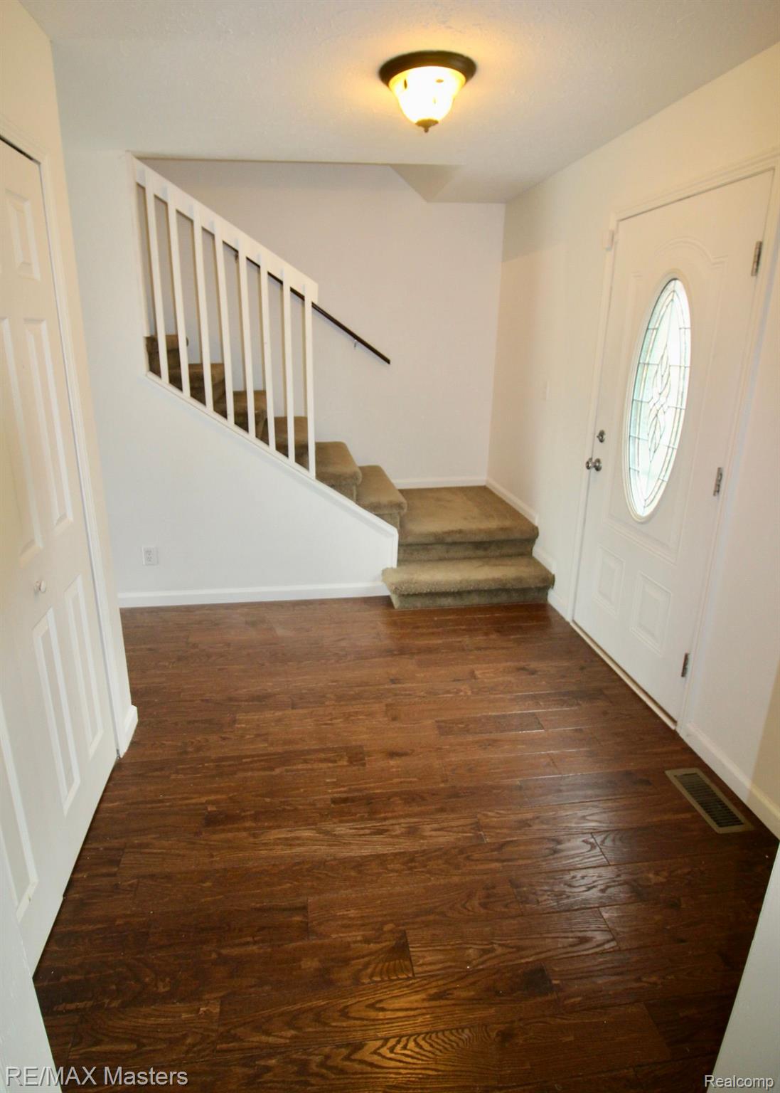 Spacious front entry with coat closet.