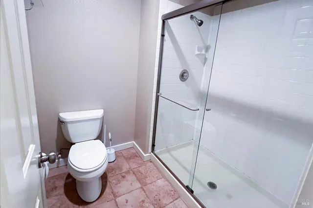 a view of bedroom with walk in closet