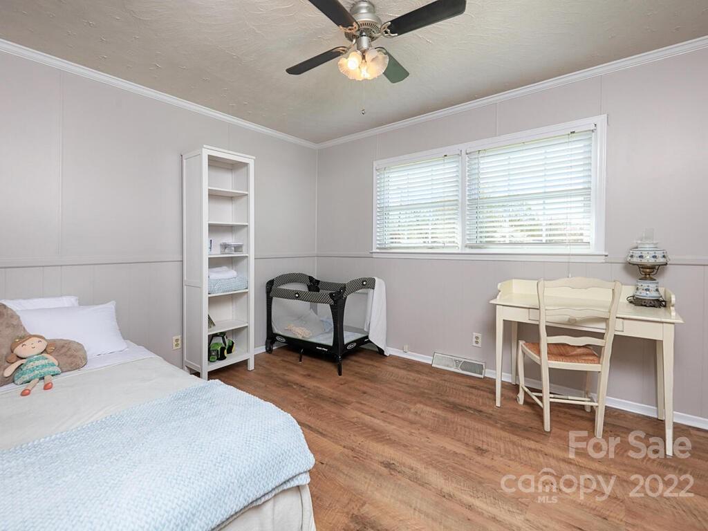 5600 Wright Road Kannapolis, NC 28081 - Photo 29 of 45 a bed room with a bed and a chair