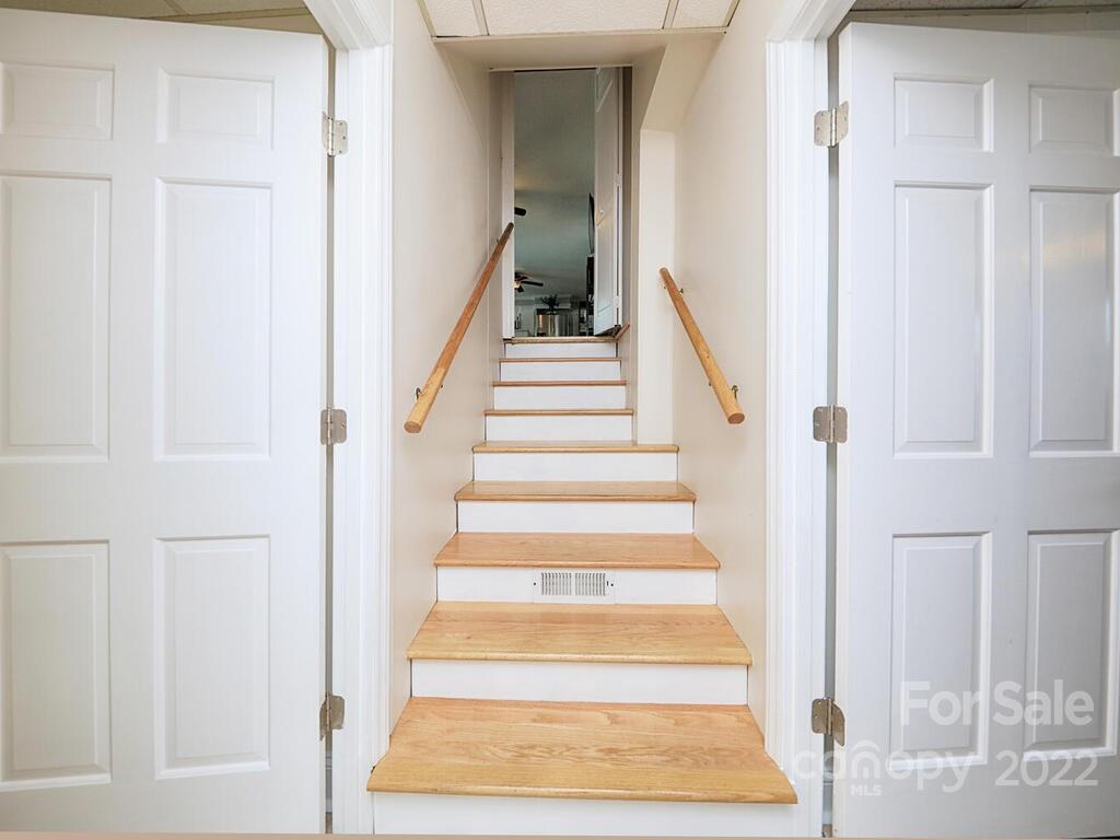 5600 Wright Road Kannapolis, NC 28081 - Photo 34 of 45 a view of staircase with white walls and white walls