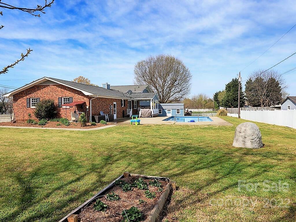 5600 Wright Road Kannapolis, NC 28081 - Photo 41 of 45 a swimming pool with outdoor seating and yard