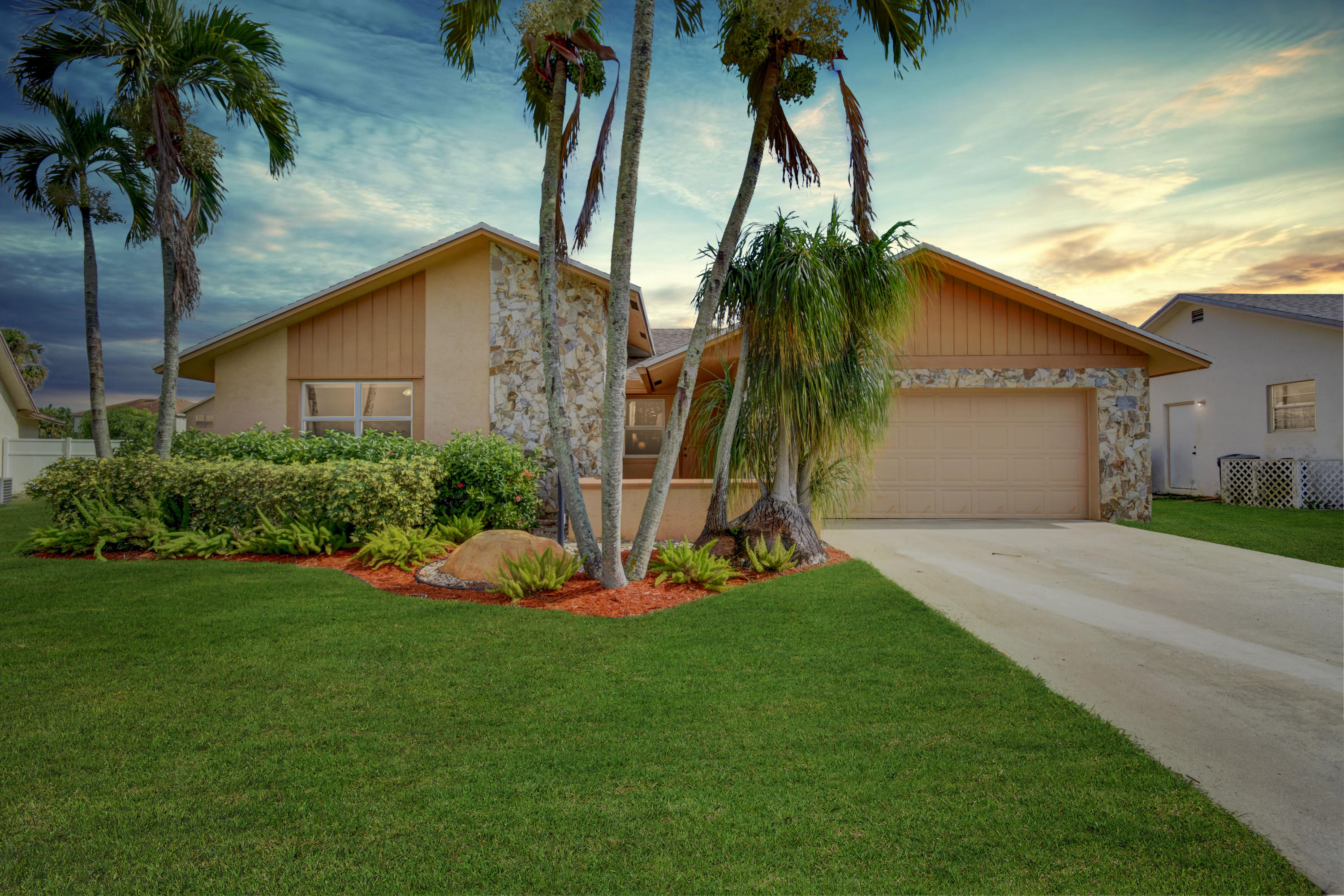 23034 Southwest 53rd Avenue Boca Raton, FL 33433 - Photo 1 of 48 Front Fun Twilight