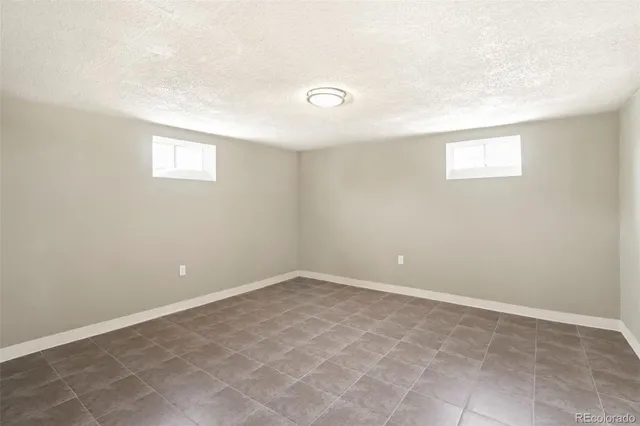 an empty room with a workbench