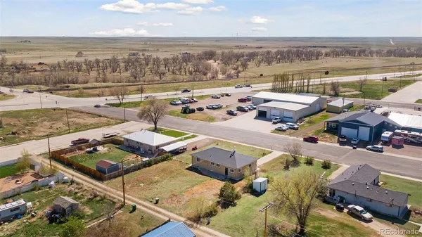 an aerial view of a building with outdoor space