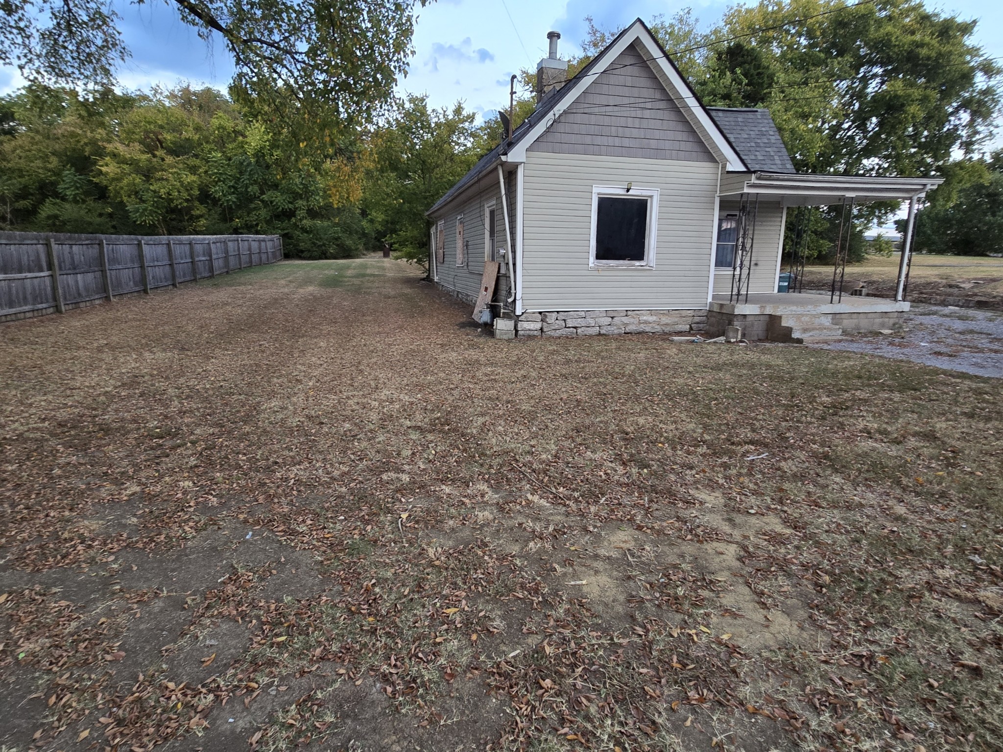 207 Cedar Street Lebanon, TN 37087 - Photo 2 of 4 a view of house with backyard space and garden
