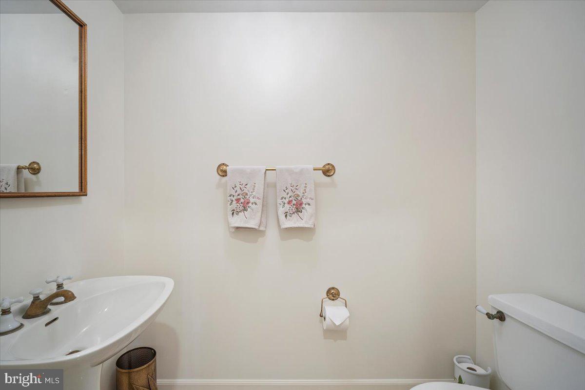 2 Candlelight Court Potomac, MD 20854 - Photo 25 of 58 a bathroom with a sink and a toilet