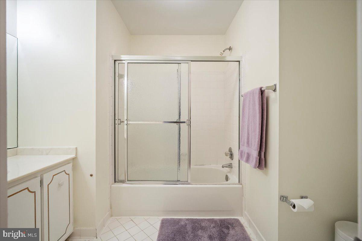 2 Candlelight Court Potomac, MD 20854 - Photo 35 of 58 a bathroom with a bathtub and a shower