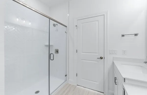 an empty room with a ceiling fan and a ceiling fan