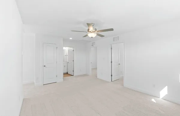 a bathroom with a shower and a sink