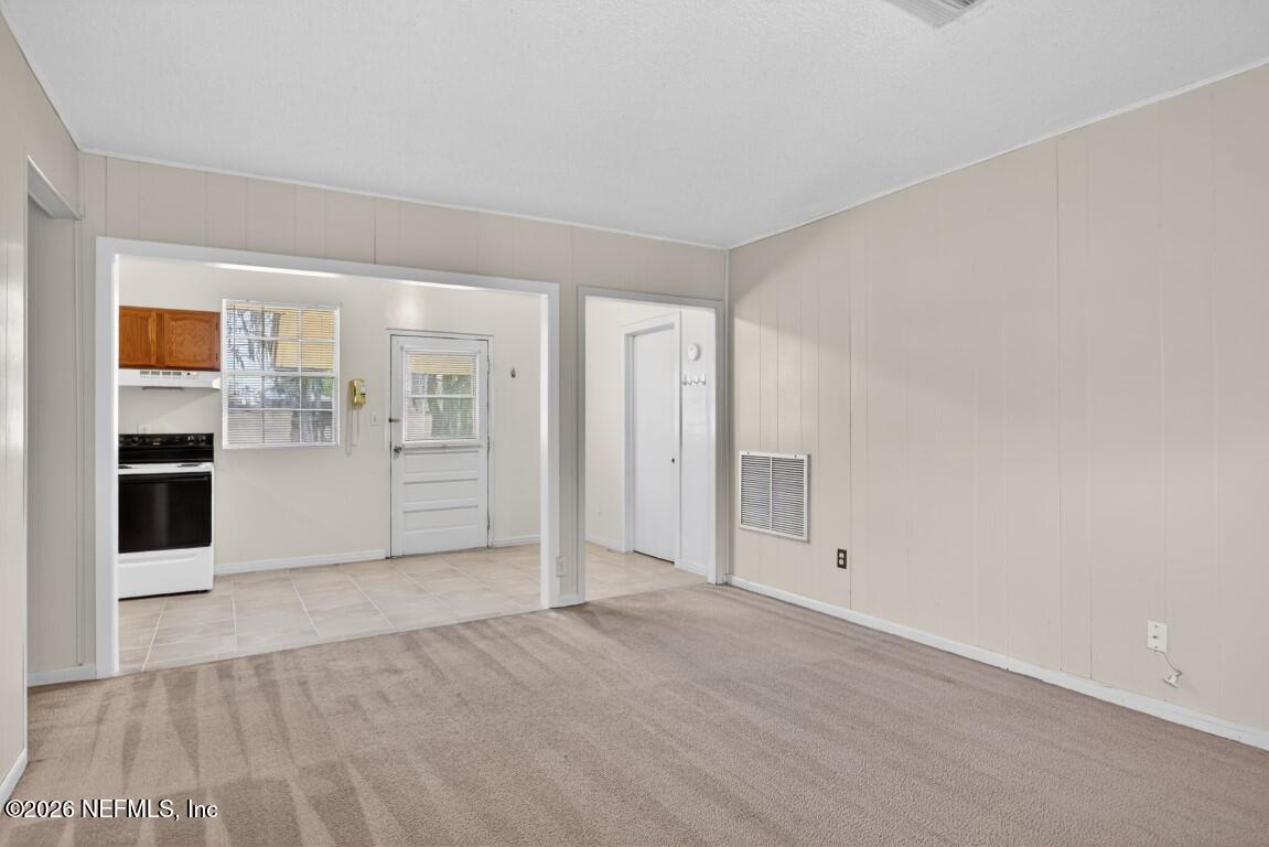 8900 Crystal Springs Road Jacksonville, FL 32221 - Photo 8 of 29 08-Living Room to Dining