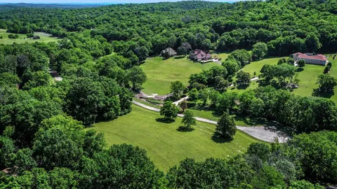 a view of a garden with a fountain