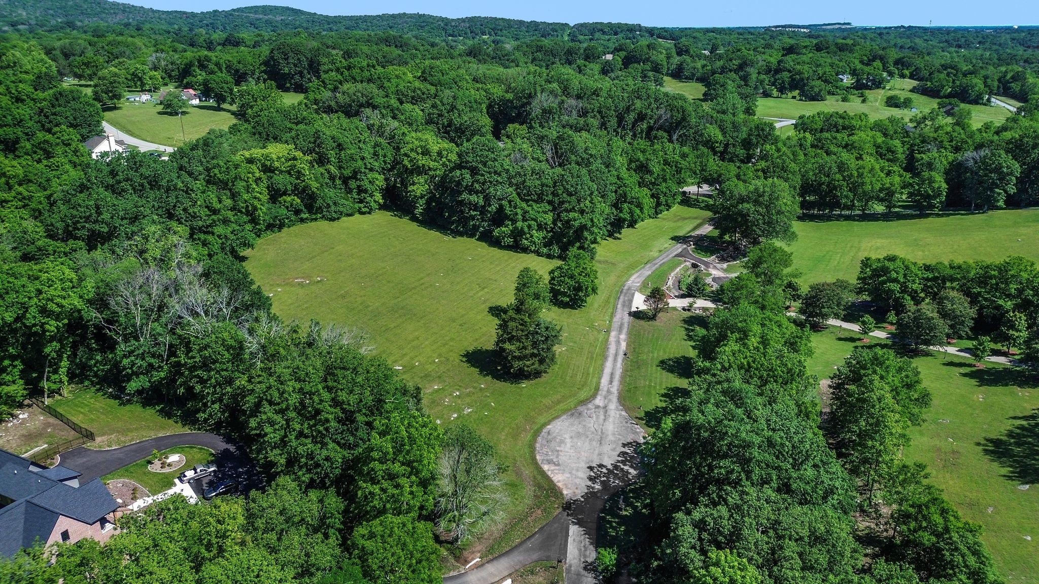 110 Hidden Valley Road Arrington, TN 37014 - Photo 4 of 19 an aerial view of a lush green valley