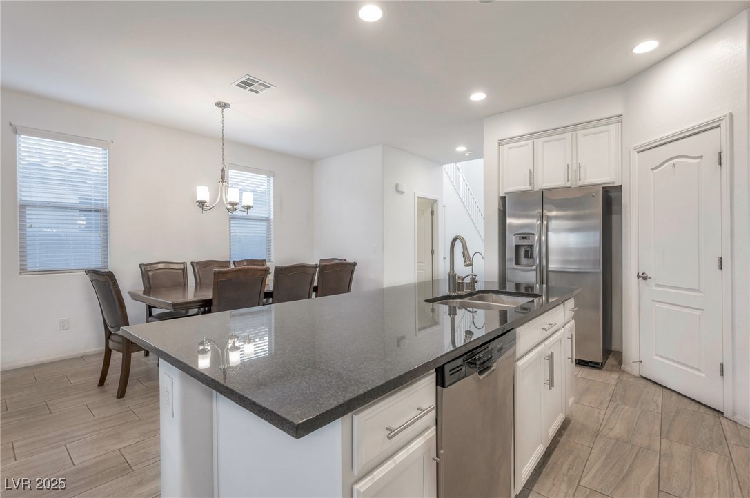 6233 Andover Wood Road Las Vegas, NV 89113 - Photo 9 of 25 Granite countertops island with sink