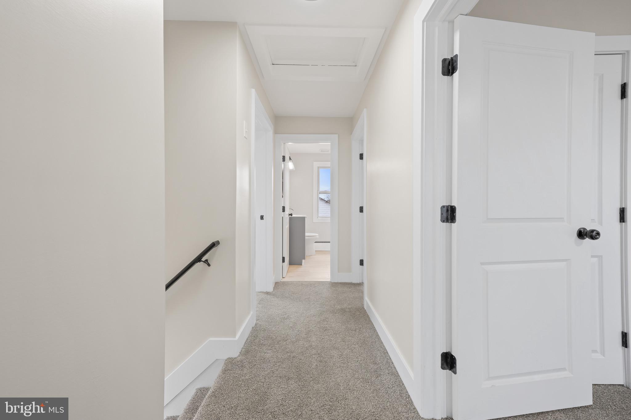261 B Street Carneys Point, NJ 08069 - Photo 16 of 32 a view of a hallway with white walls