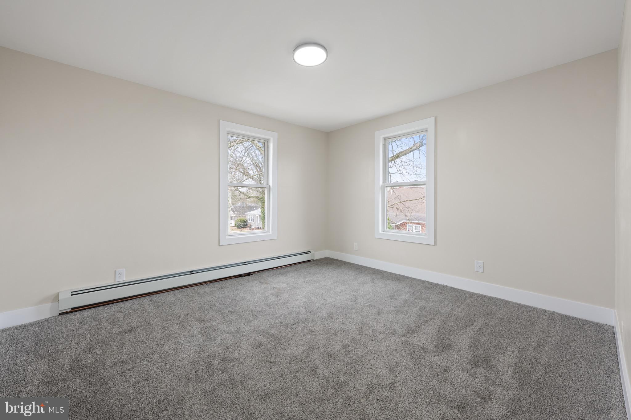 261 B Street Carneys Point, NJ 08069 - Photo 17 of 32 an empty room with windows