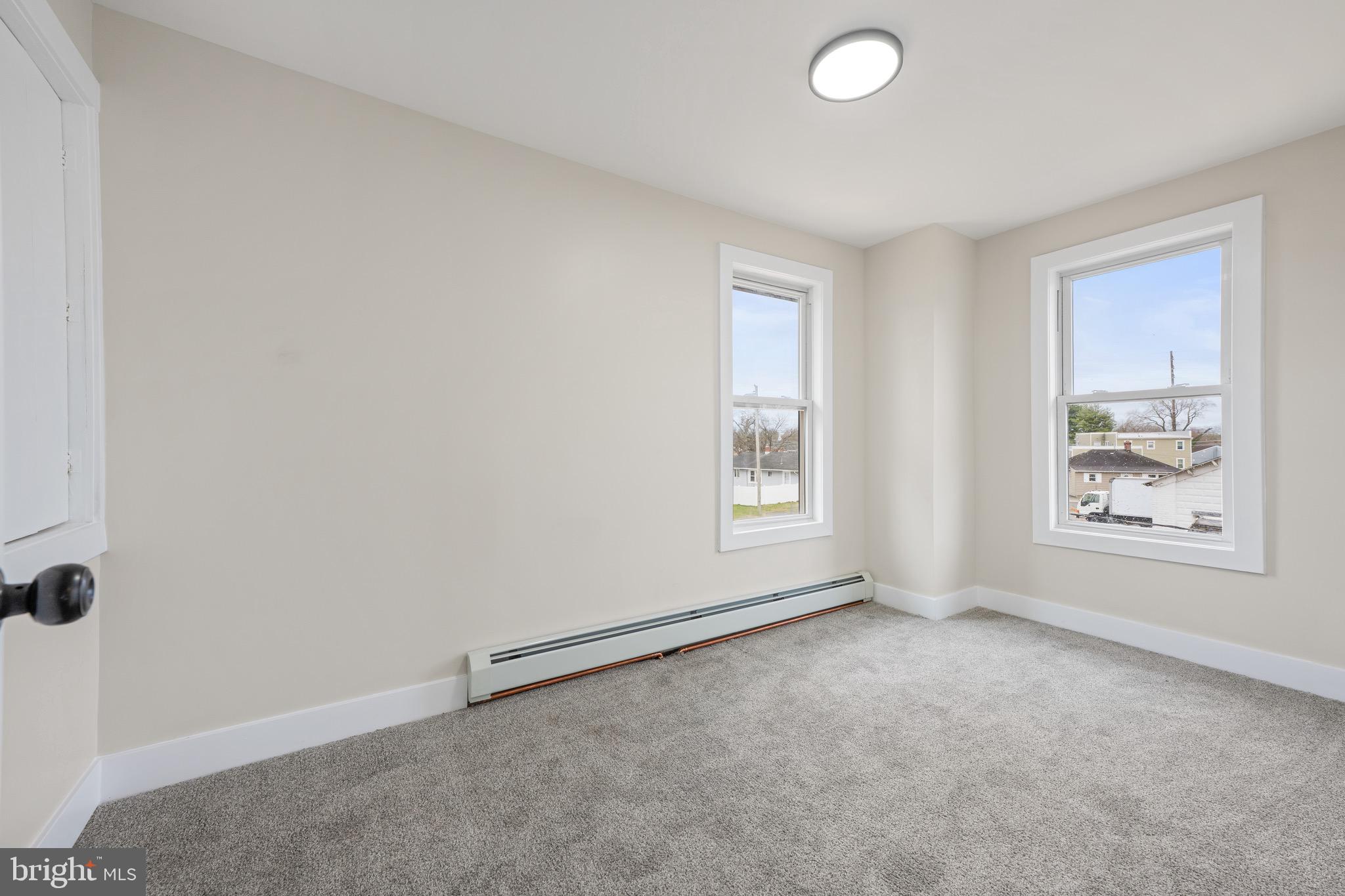 261 B Street Carneys Point, NJ 08069 - Photo 23 of 32 an empty room with windows