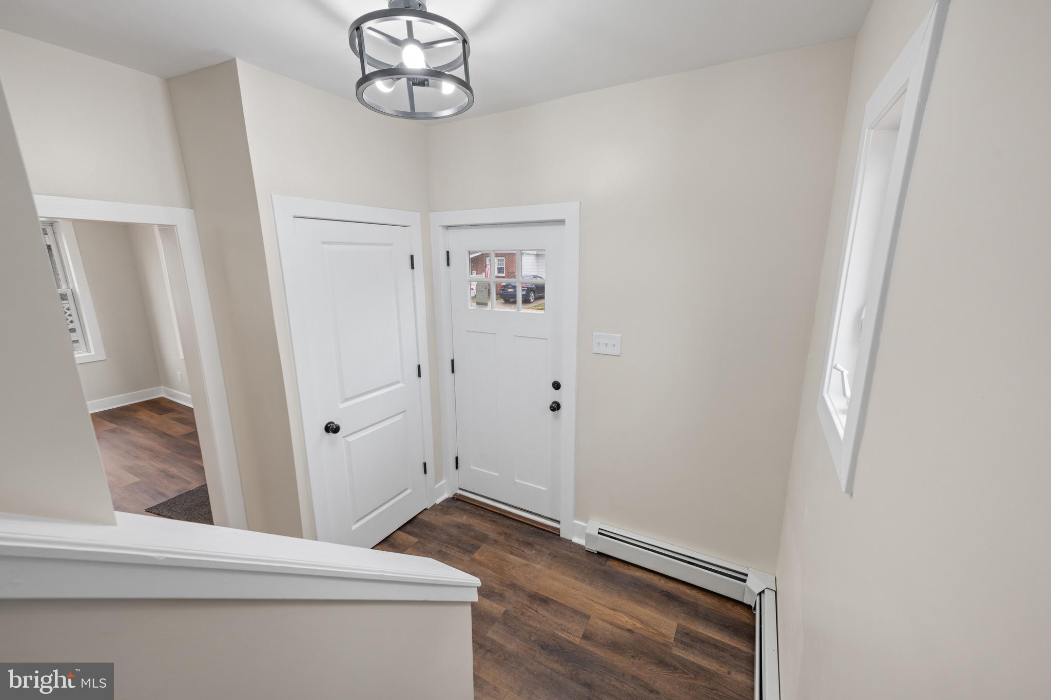 261 B Street Carneys Point, NJ 08069 - Photo 25 of 32 a view of room with wooden floor