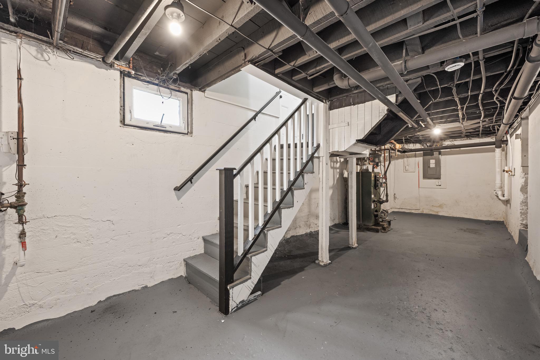 261 B Street Carneys Point, NJ 08069 - Photo 26 of 32 a view of an empty room with stairs