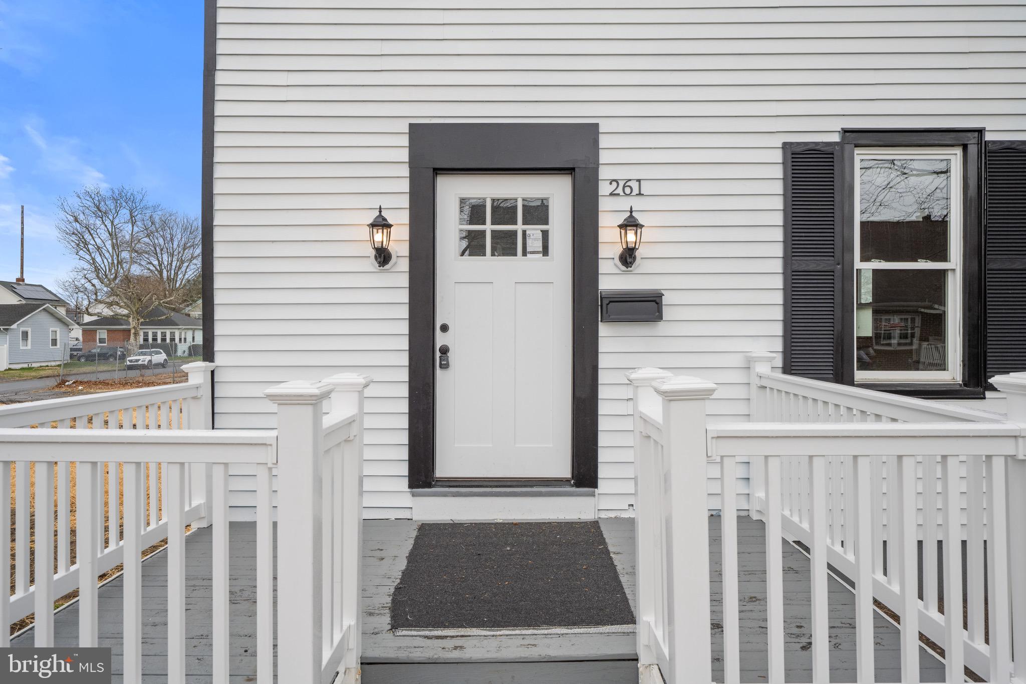261 B Street Carneys Point, NJ 08069 - Photo 28 of 32 a view of a house with a door and a window