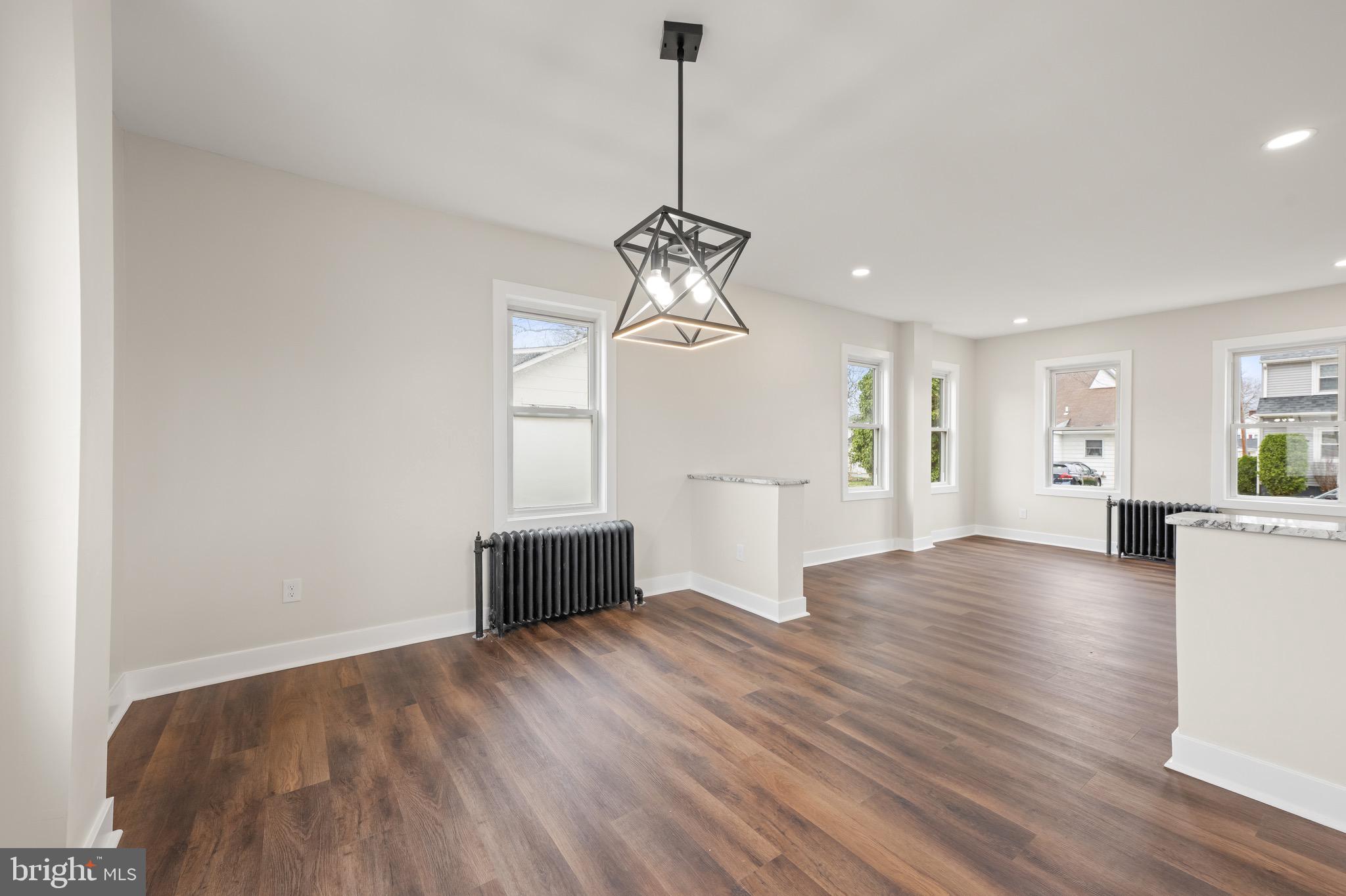 261 B Street Carneys Point, NJ 08069 - Photo 10 of 32 a view of empty room with wooden floor