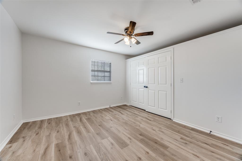 1382 Us Highway Denison, TX 75021 - Photo 11 of 25 a view of empty room with wooden floor