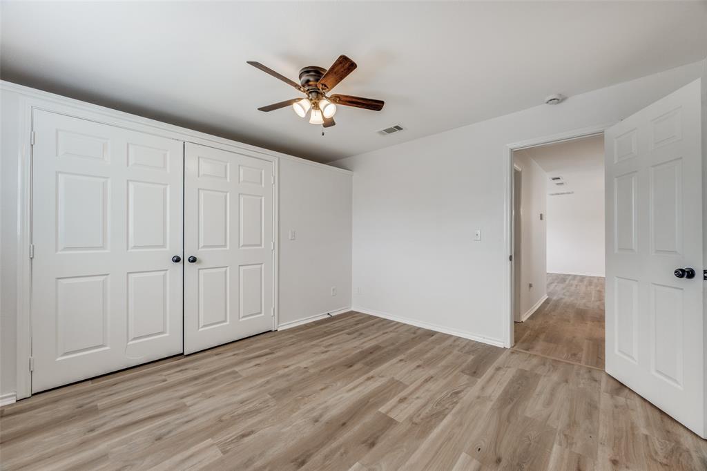 1382 Us Highway Denison, TX 75021 - Photo 12 of 25 a view of empty room with wooden floor