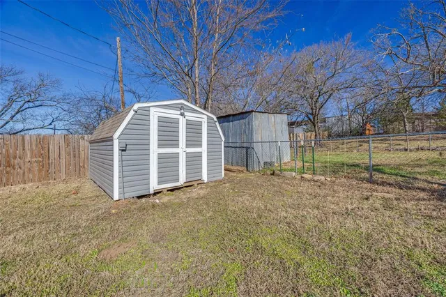 a view of a backyard of house