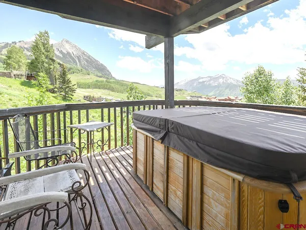 a view of balcony with furniture