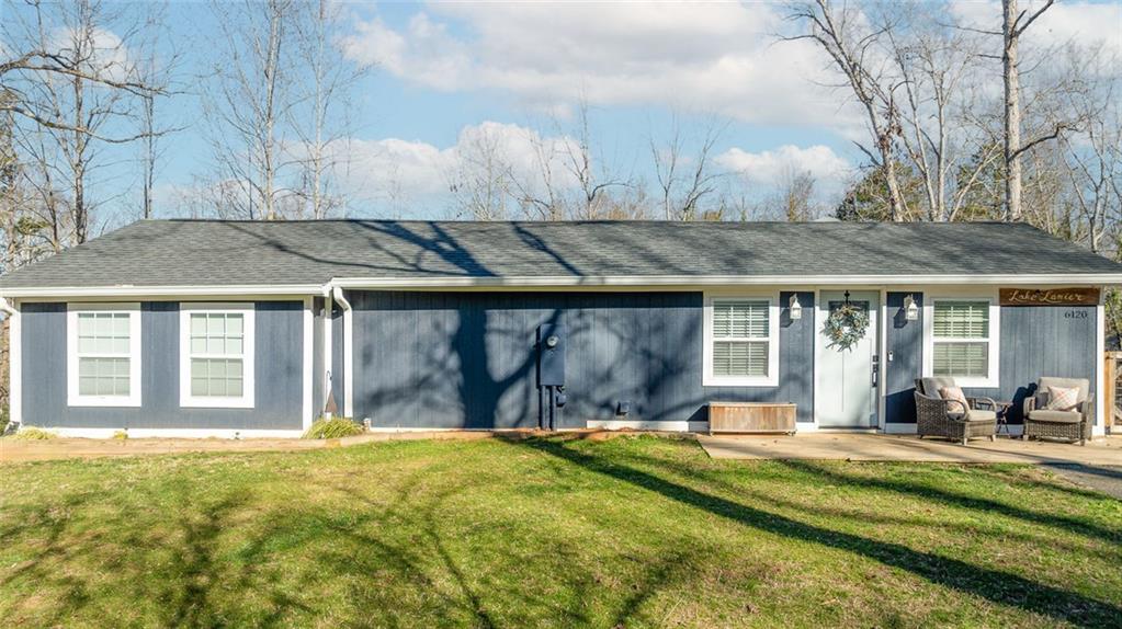 6120 Cardinal Drive Gainesville, GA 30506 - Photo 2 of 34 a view of a house with a swimming pool