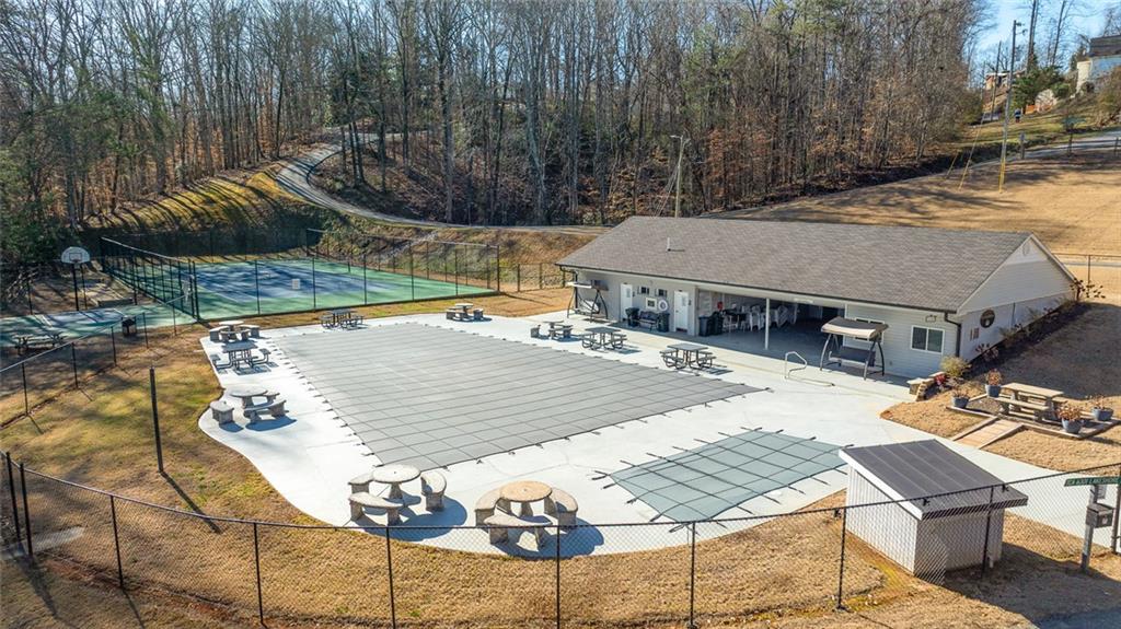 6120 Cardinal Drive Gainesville, GA 30506 - Photo 30 of 34 a view of a patio with table and chairs