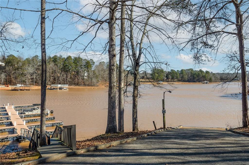6120 Cardinal Drive Gainesville, GA 30506 - Photo 33 of 34 a view of a water with large trees