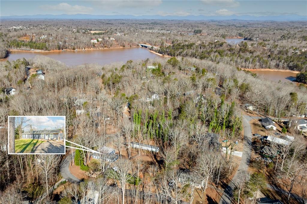 6120 Cardinal Drive Gainesville, GA 30506 - Photo 4 of 34 an aerial view of residential houses with outdoor space
