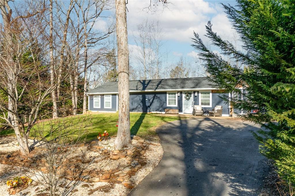6120 Cardinal Drive Gainesville, GA 30506 - Photo 5 of 34 a view of house with outdoor space