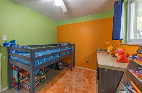 a room with furniture and window