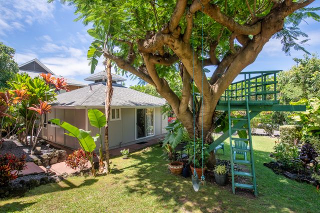 a house view with a garden space