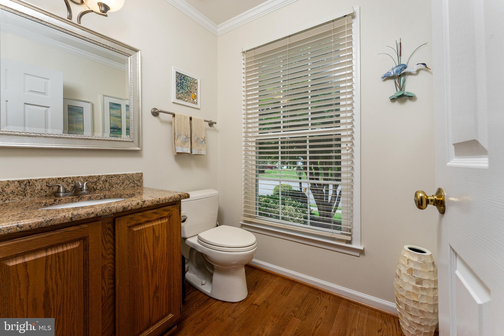 13824 Springstone Drive Clifton, VA 20124 - Photo 11 of 56 a bathroom with a sink toilet and shower