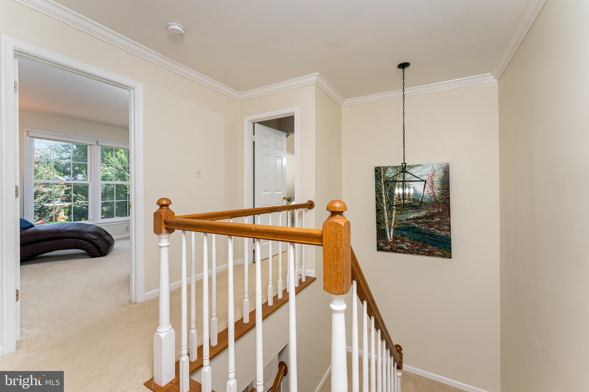 13824 Springstone Drive Clifton, VA 20124 - Photo 13 of 56 a view of a hallway with windows