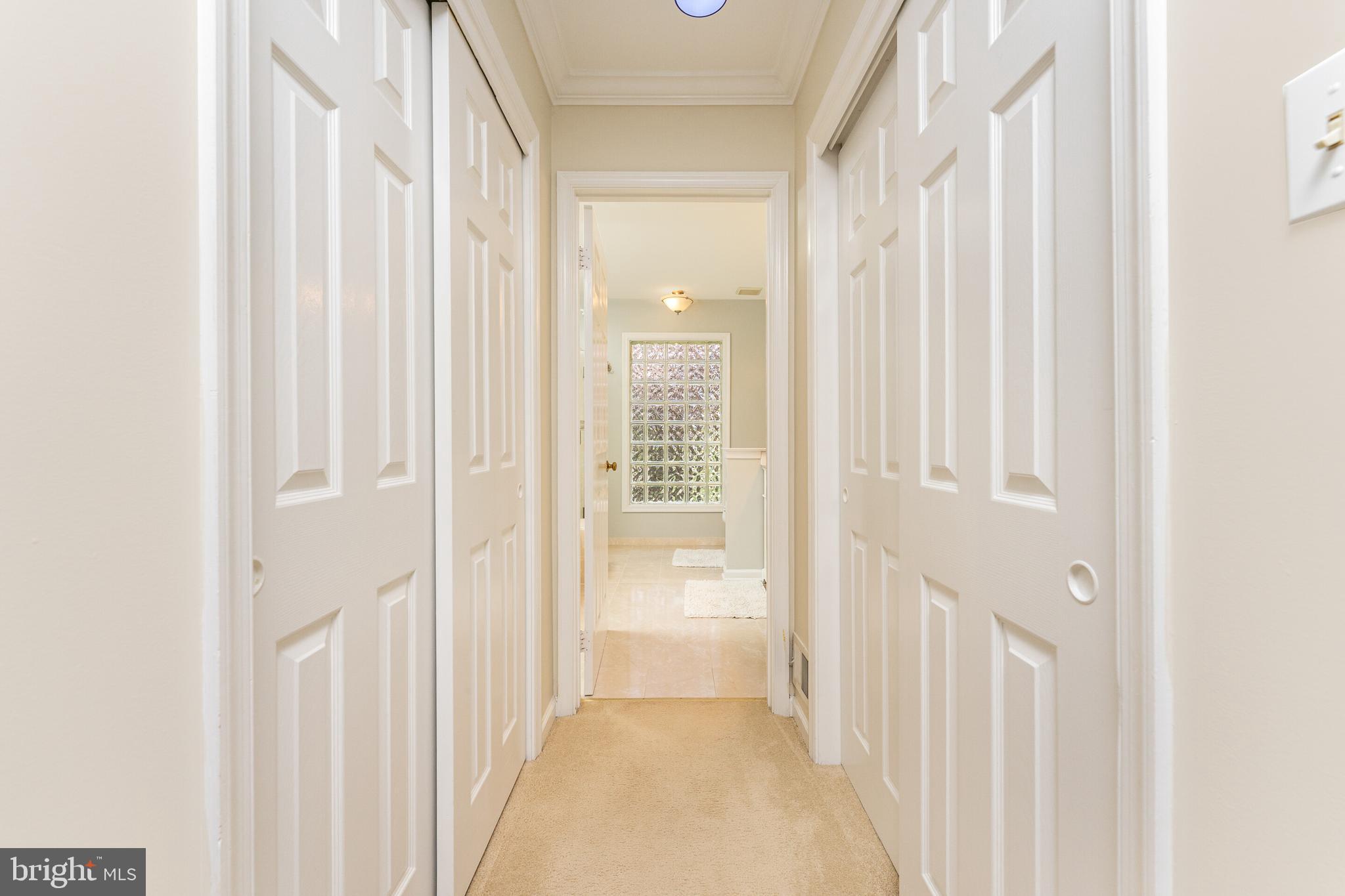 13824 Springstone Drive Clifton, VA 20124 - Photo 16 of 56 a view of a bathroom from a hallway