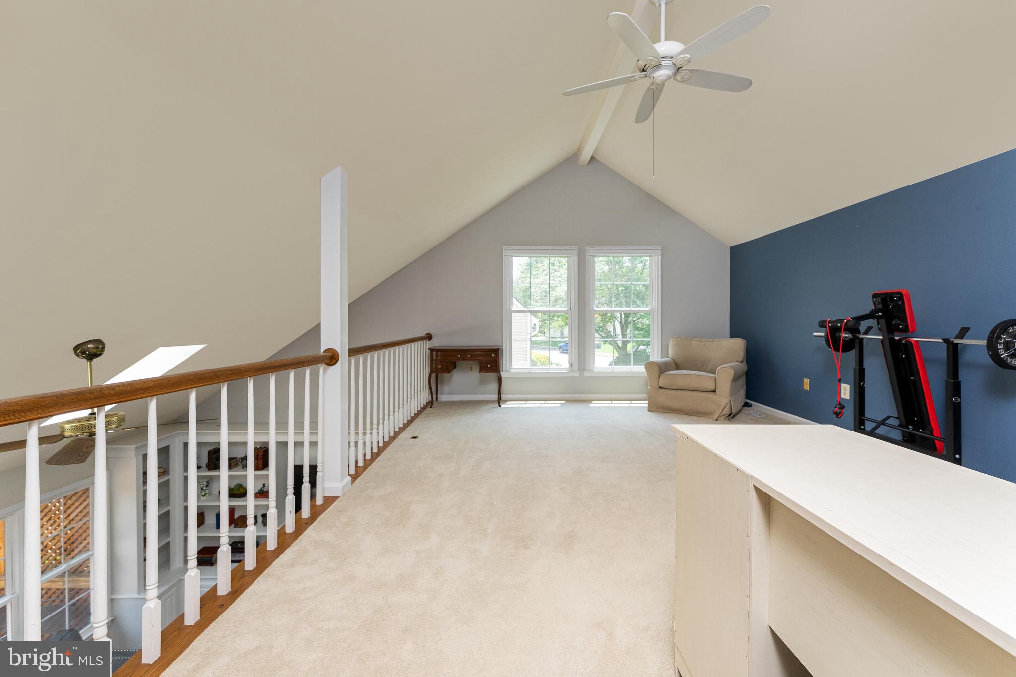 13824 Springstone Drive Clifton, VA 20124 - Photo 19 of 56 a view of hallway with furniture and a chandelier