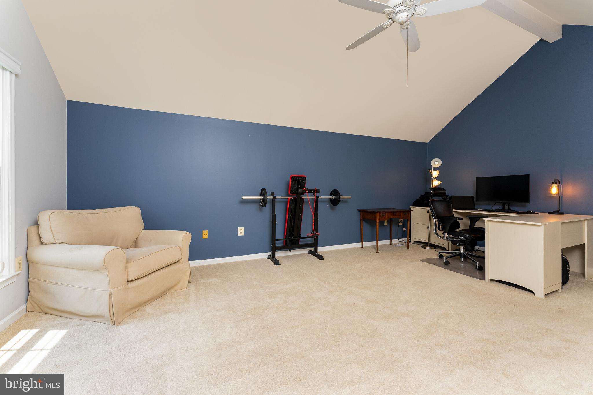 13824 Springstone Drive Clifton, VA 20124 - Photo 20 of 56 a room with furniture and a flat screen tv