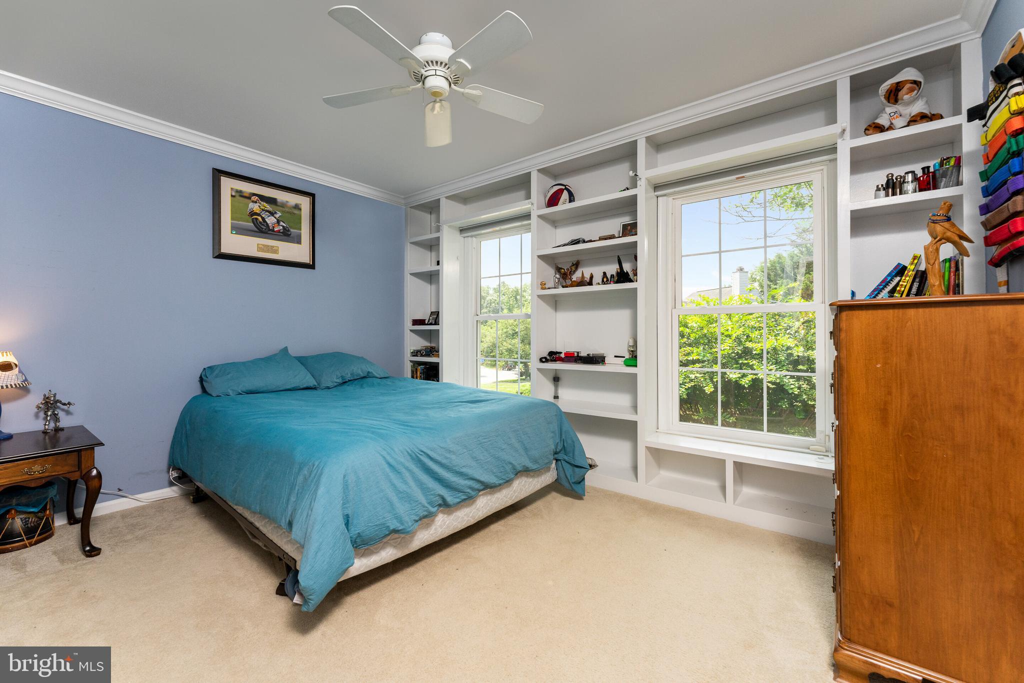 13824 Springstone Drive Clifton, VA 20124 - Photo 21 of 56 a bedroom with a large bed and a window