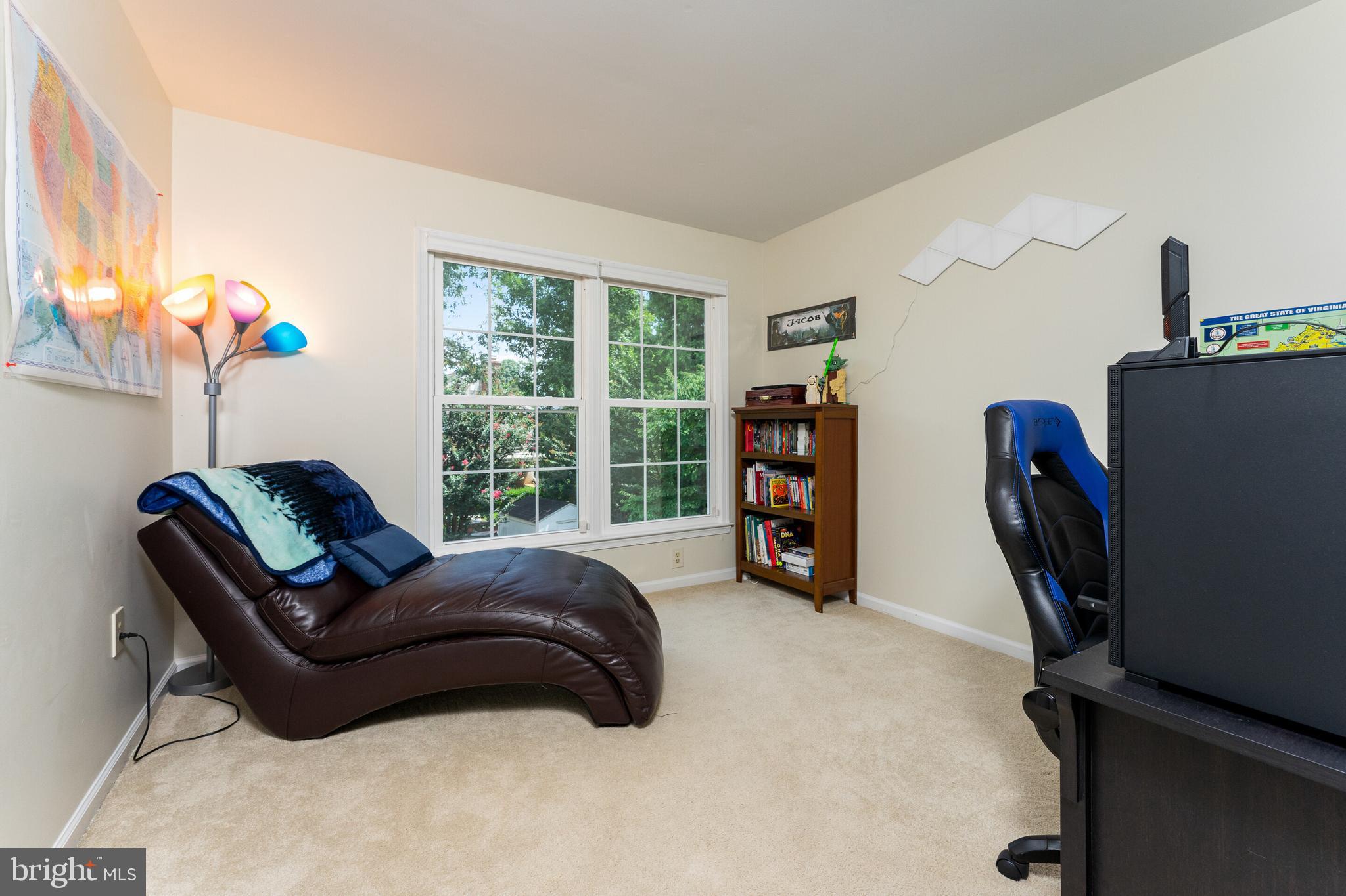 13824 Springstone Drive Clifton, VA 20124 - Photo 22 of 56 a living room with furniture and a window