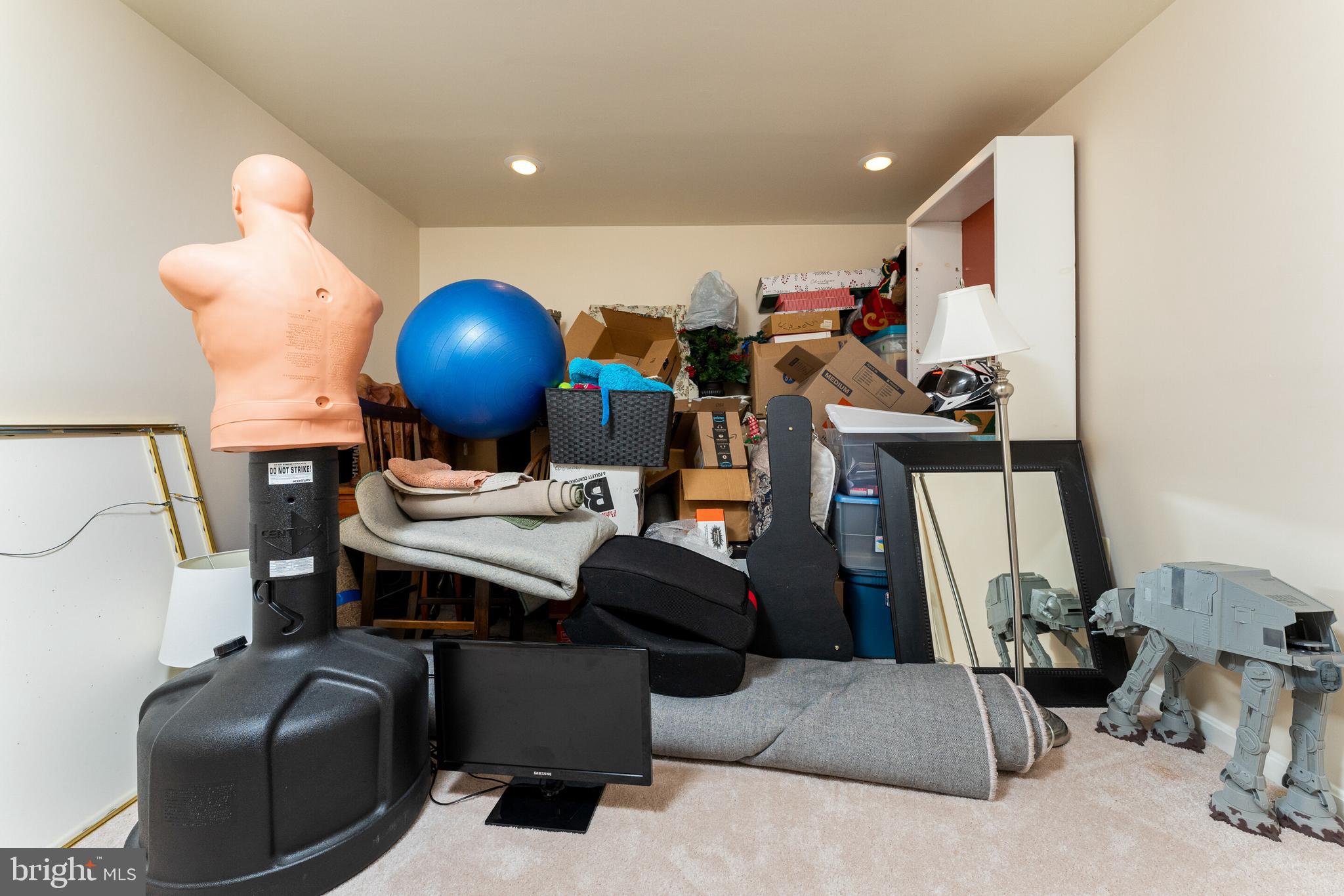 13824 Springstone Drive Clifton, VA 20124 - Photo 28 of 56 a view of a workspace with furniture and a mirror