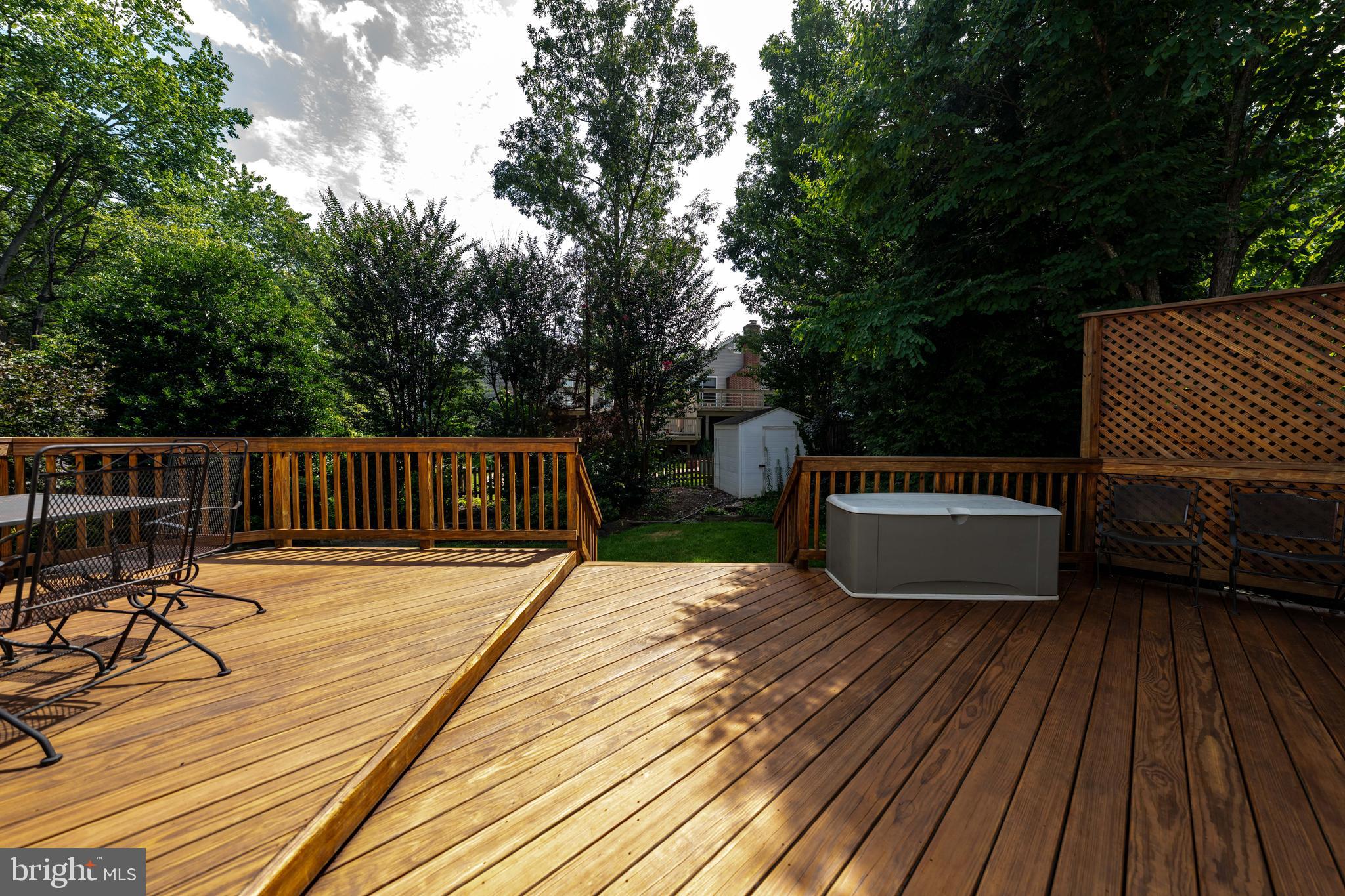 13824 Springstone Drive Clifton, VA 20124 - Photo 39 of 56 a view of balcony with wooden floor and outdoor seating