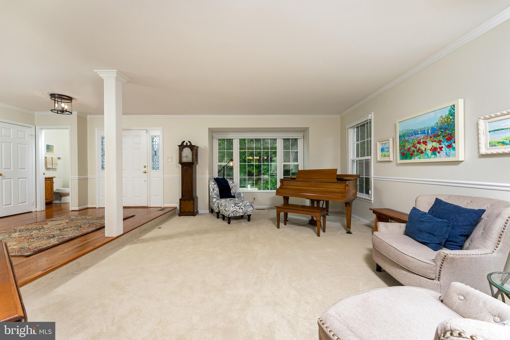 13824 Springstone Drive Clifton, VA 20124 - Photo 4 of 56 a living room with furniture and a window