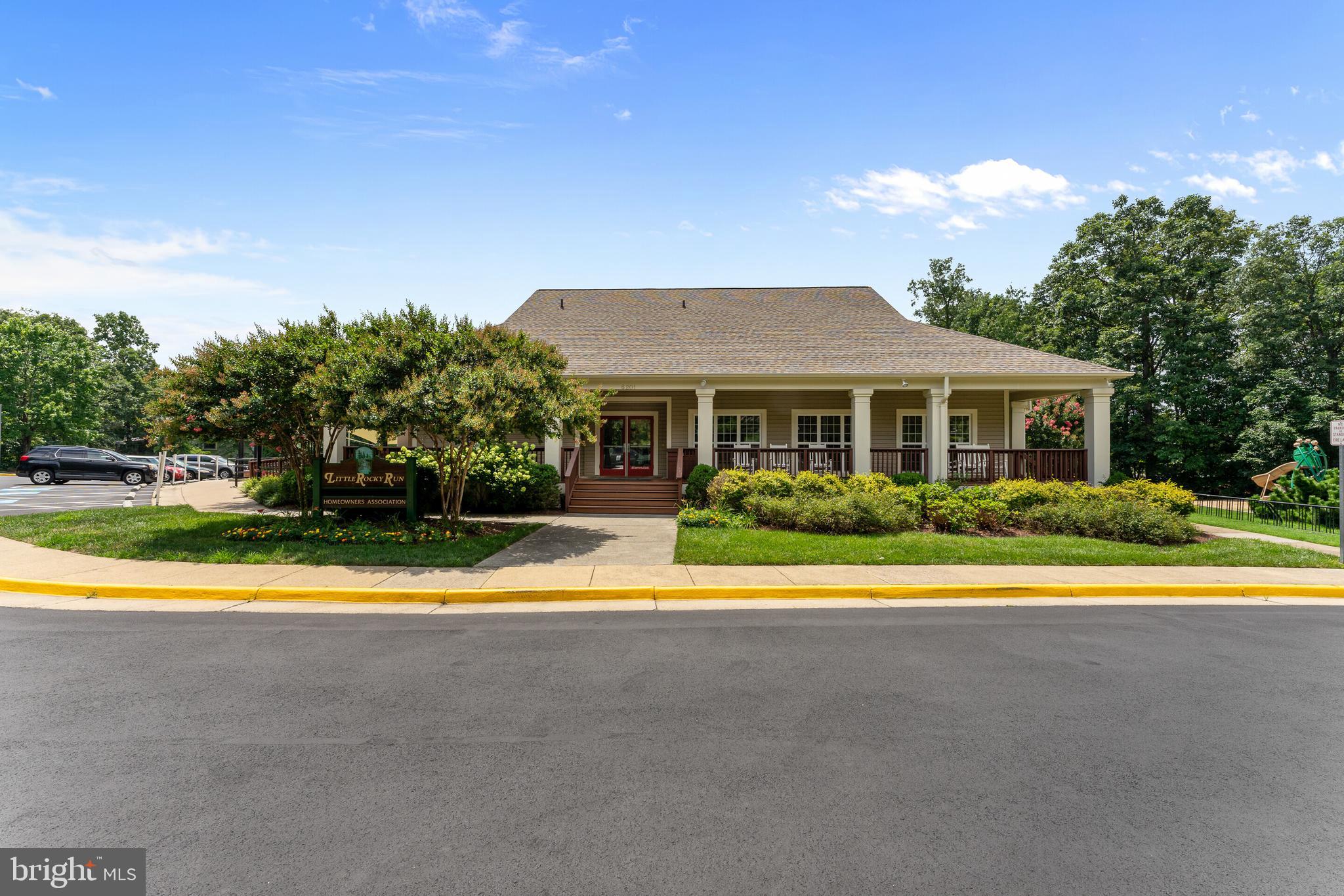 13824 Springstone Drive Clifton, VA 20124 - Photo 51 of 56 a view of swimming pool with tree in front of it