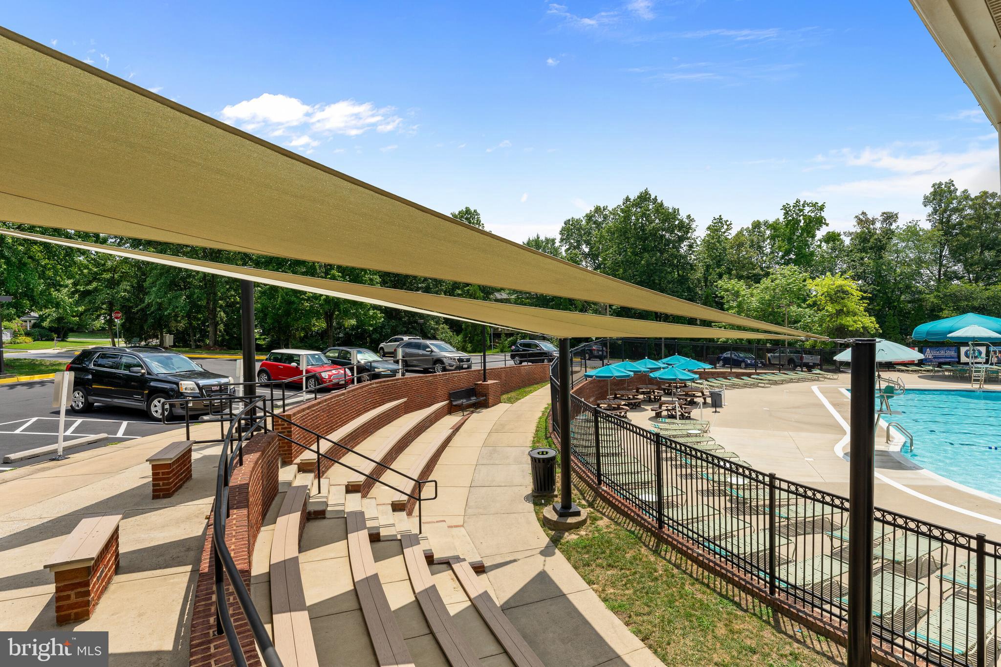13824 Springstone Drive Clifton, VA 20124 - Photo 55 of 56 a view of swimming pool with seating area and furniture
