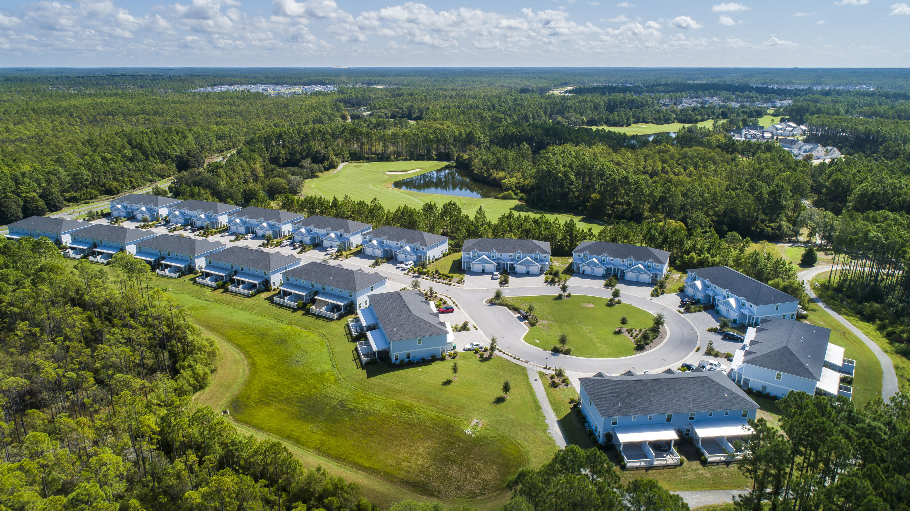 45 Golden Bell Court, Unit 45C Inlet Beach, FL 32461 - Photo 38 of 49 an aerial view of a house with swimming pool and large trees
